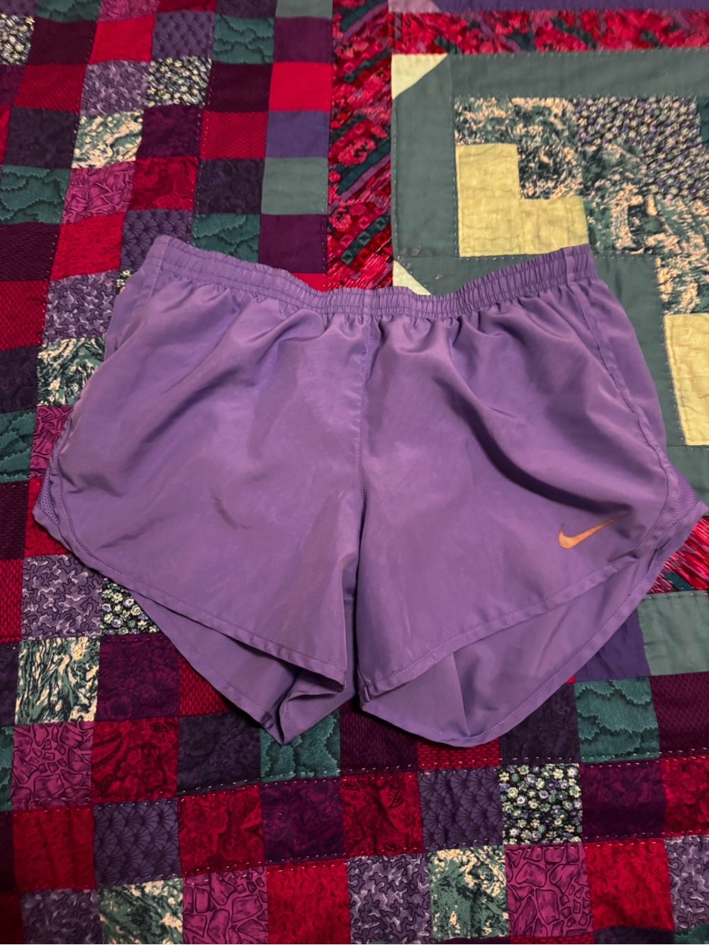 Nike Women's Lavender Athletic Running Shorts with Orange Swoosh